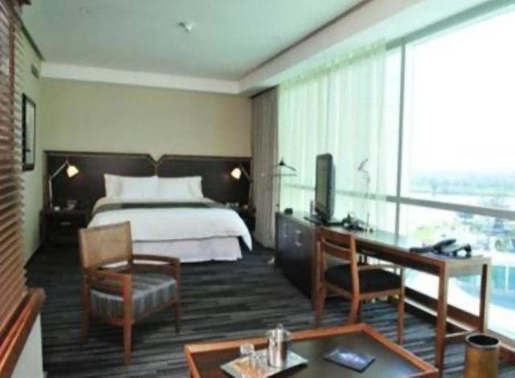 Hotel Dreams Valdivia Zimmer foto A room at the hotel