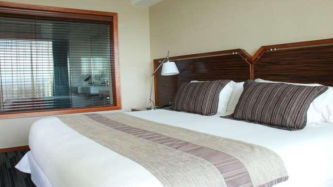 Hotel Dreams Valdivia Zimmer foto A bed runner